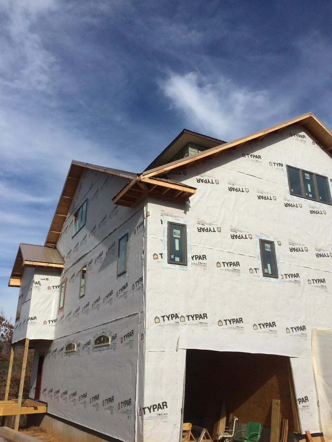 Stick built house wrapped in Typar with new roof framing and dormers in Colts Neck
